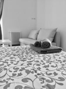 Łóżko lub łóżka w pokoju w obiekcie B&B Sant'Agostino