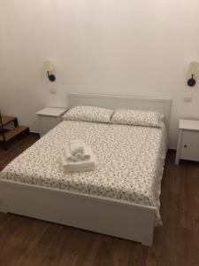 Łóżko lub łóżka w pokoju w obiekcie B&B Sant'Agostino