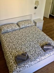 Łóżko lub łóżka w pokoju w obiekcie B&B Sant'Agostino