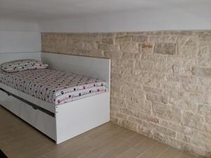 Łóżko lub łóżka w pokoju w obiekcie B&B Sant'Agostino