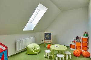 Posteľ alebo postele v izbe v ubytovaní Apartmány Volarik