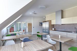 Kuchyňa alebo kuchynka v ubytovaní Apartmány Volarik