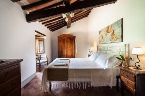Postel nebo postele na pokoji v ubytování Agriturismo di Baroni Enzo
