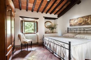 Postel nebo postele na pokoji v ubytování Agriturismo di Baroni Enzo
