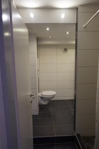 Koupelna v ubytování Apartment Zirkusstraße