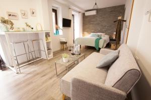 Televízia a/alebo spoločenská miestnosť v ubytovaní Lukanda Casa de las Especias
