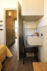Kuchyň nebo kuchyňský kout v ubytování Albergo Benito + 21 fotografií