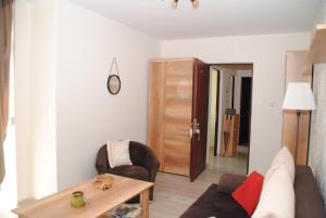 Posedenie v ubytovaní Szamóca Apartman