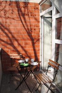Patio alebo iná vonkajšia časť ubytovania Szamóca Apartman
