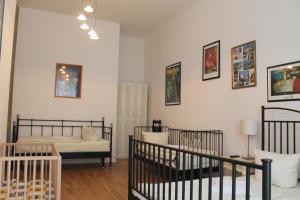 Postel nebo postele na pokoji v ubytování Hotel Pension Waizenegger am Kurfürstendamm