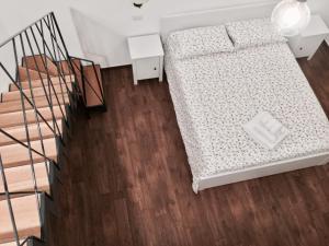 Łóżko lub łóżka w pokoju w obiekcie B&B Sant'Agostino