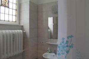 Koupelna v ubytování Hotel Pension Kima