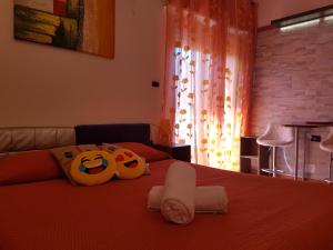 Postel nebo postele na pokoji v ubytování B&B Alghero Republic