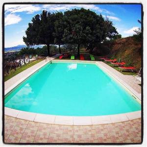 The swimming pool at or close to Il Poggio Delle Ginestre