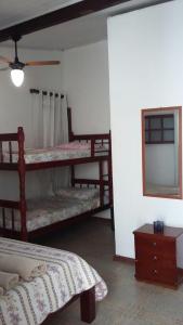 Imagen de la galería de Suítes Tropicana guesthouse, en Cabo Frío