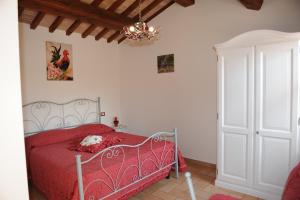 Łóżko lub łóżka w pokoju w obiekcie Agriturismo "La Fraschetta"