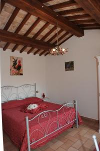 Łóżko lub łóżka w pokoju w obiekcie Agriturismo "La Fraschetta"