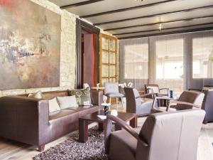 Posezení v ubytování Hotel Le Beau Séjour
