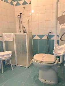 Ett badrum på Hotel Scala Greca +17 foton