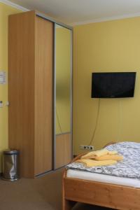 Postel nebo postele na pokoji v ubytování Horský Hotel Kristína
