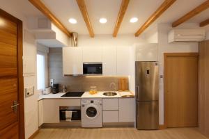 Kjøkken eller kjøkkenkrok på Ganexa Home