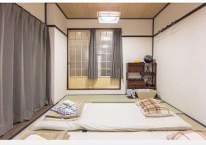 Cama o camas de una habitación en Riusu - 流苏 -