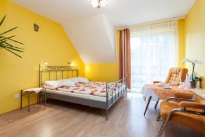 Postel nebo postele na pokoji v ubytování Villa Ula