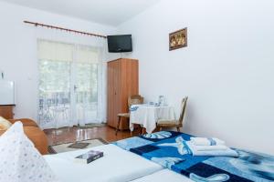 Postel nebo postele na pokoji v ubytování Villa Ula