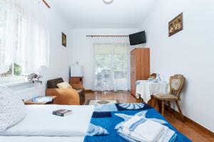 Postel nebo postele na pokoji v ubytování Villa Ula