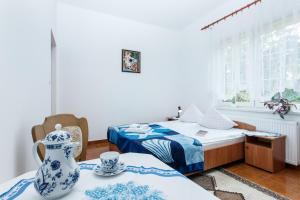 Postel nebo postele na pokoji v ubytování Villa Ula