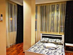 Postel nebo postele na pokoji v ubytování Golden House + 18 fotografií