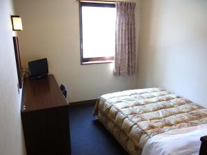 Postel nebo postele na pokoji v ubytování Hotel Tamanoya + 26 fotografií