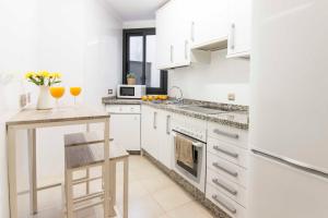 Kuchyňa alebo kuchynka v ubytovaní Malaga Center Flat Holidays Atarazanas Market