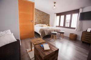 Ένα ή περισσότερα κρεβάτια σε δωμάτιο στο Lukanda Casa de las Especias