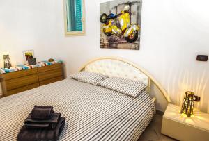 Postel nebo postele na pokoji v ubytování Casa vacanze Letto & Latte