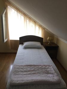 Letto o letti in una camera di Mari Guest House