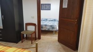 Postel nebo postele na pokoji v ubytování Agriturismo La Barca In Secca