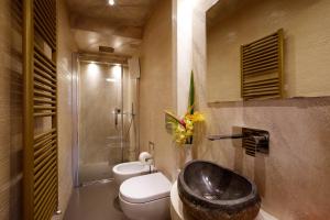 a bathroom with a sink and a toilet and a shower at B&B Il Parco in Monterosso al Mare