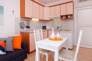 Kuchyň nebo kuchyňský kout v ubytování Apartments Villa Adria Bol