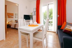 Postel nebo postele na pokoji v ubytování Apartments Villa Adria Bol