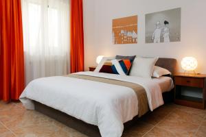 Postel nebo postele na pokoji v ubytování Apartments Villa Adria Bol