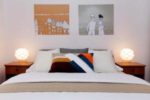 Postel nebo postele na pokoji v ubytování Apartments Villa Adria Bol