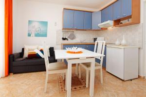 Kuchyň nebo kuchyňský kout v ubytování Apartments Villa Adria Bol