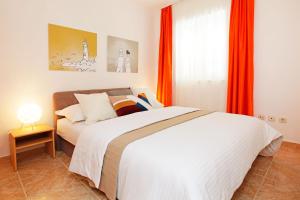 Postel nebo postele na pokoji v ubytování Apartments Villa Adria Bol