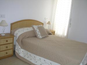 Łóżko lub łóżka w pokoju w obiekcie Ribera Beach 3 - 1208