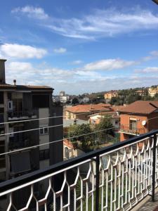 a balcony with a view of a city at Big Family in Ariccia