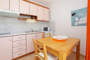 Kuchyň nebo kuchyňský kout v ubytování Apartments Villa Adria Bol
