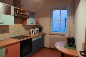 a small kitchen with a sink and a window at Apartment Nepomuk in Kirchberg an der Pielach