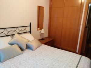Postel nebo postele na pokoji v ubytování Iradri, Apartamento Playa Gijón