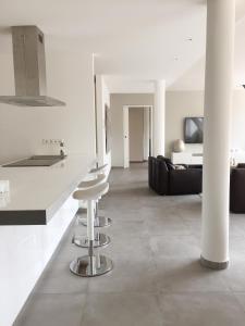 O bucătărie sau chicinetă la Luxery Loft Apartment